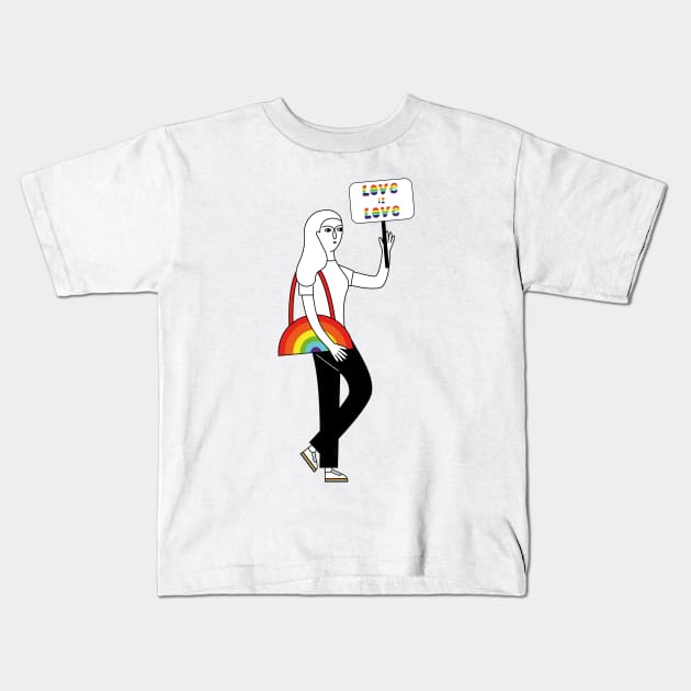 Girl holds a poster with the slogan Love is Love Kids T-Shirt by Savvalinka